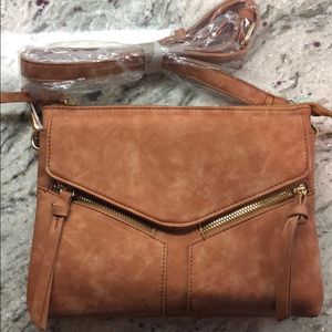 Tan cross body bag